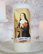 Espoir dans les situations impossibles, réconfort dans la souffrance, force face aux épreuves
Allumez cette bougie de neuvaine à Sainte Rita pour confier vos intentions liées aux causes désespérées, aux situations difficiles ou sans issue apparente. Sainte Rita est une intercesseuse puissante pour obtenir un appui divin et un apaisement du cœur.
