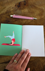 Ce carnet, illustré d'une femme dans différentes postures de yoga est une invitation à vous recentrer, à respirer et à vous reconnecter à votre espace intérieur. Il vous accompagne dans votre pratique du yoga, de la méditation ou du développement personnel.Chaque page vierge est un espace de liberté, où vous pouvez déposer vos réflexions, vos intentions, vos ressentis ou vos prises de conscience après une séance. Écrire devient ainsi un prolongement de votre pratique, une forme de méditation en soi.